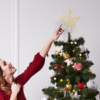 Kép 2/2 - Karácsonyfa csúcsdísz - csillag alakú - 20 x 15 cm - arany